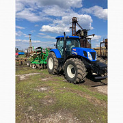 Дөңгөлөктүү трактор New Holland T7060, Сумы областы. 