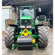 John Deere 6920S дөңгөлөктүү трактор Lemken EurOpal 7 реверсивдүү сокосу, Сумы областы. 