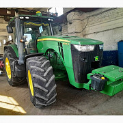 Дөңгелекті трактор John Deere 8335R, Сумы облысы. 