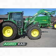 Трактор со тркала JOHN DEERE 6920, регионот Волинск. 