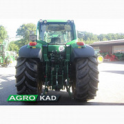 Трактор со тркала JOHN DEERE 6920, регионот Волинск. 