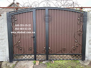 Распашные ворота из профлиста с бетонным забором Кривий Ріг